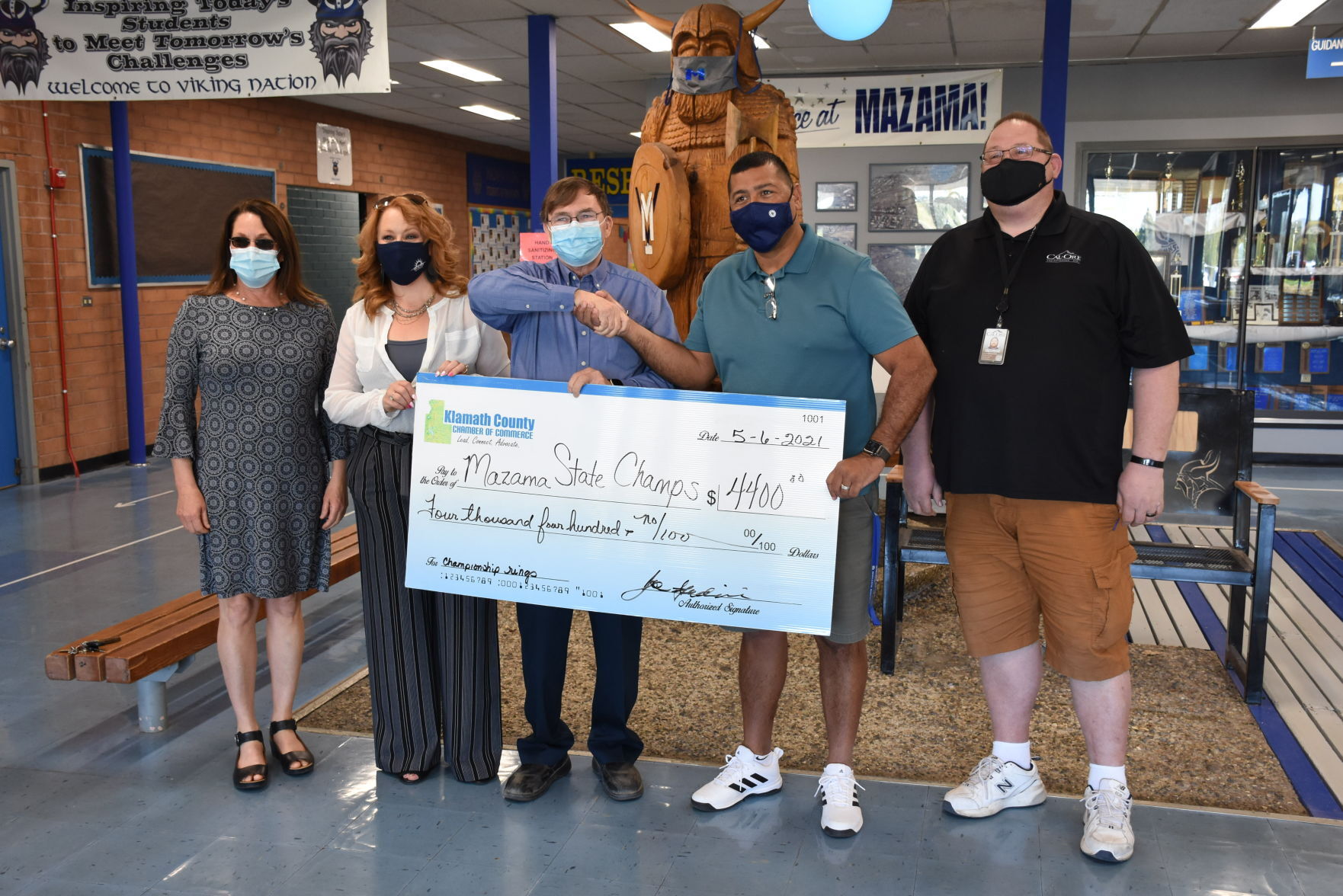 Mazama receives donation for championship rings